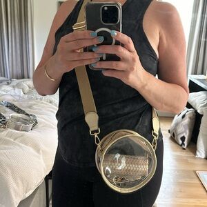 Clear Stadium Bag with gold accents.